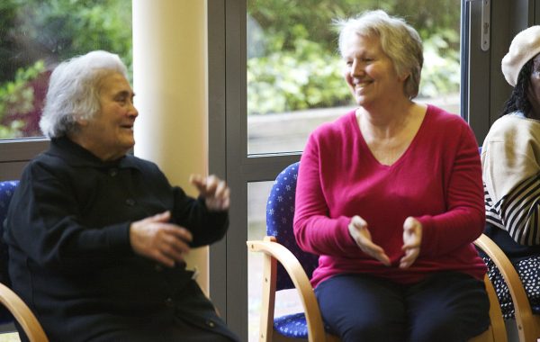 Two older women enjoying themselves at a Healthy Living Club