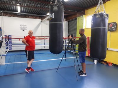 Vince poses for the camera during filming at Empire Fighting Chance