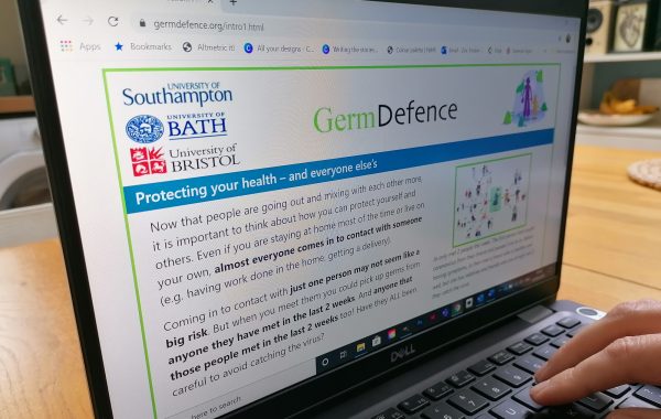 A laptop screen showing the Germ Defence website