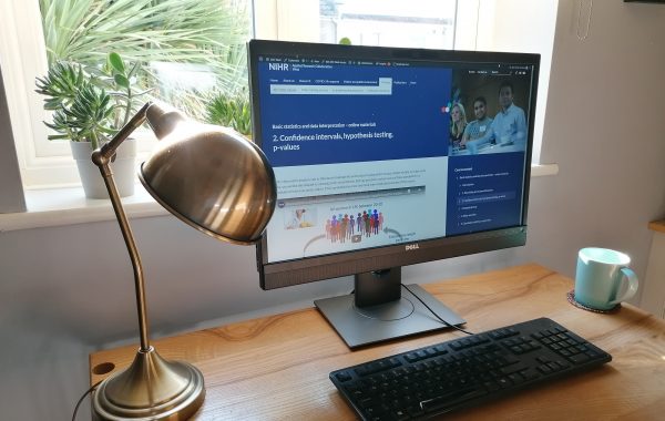 A computer monitor showing the ARC West online courses