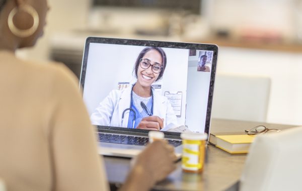 A doctor and patient having a video call