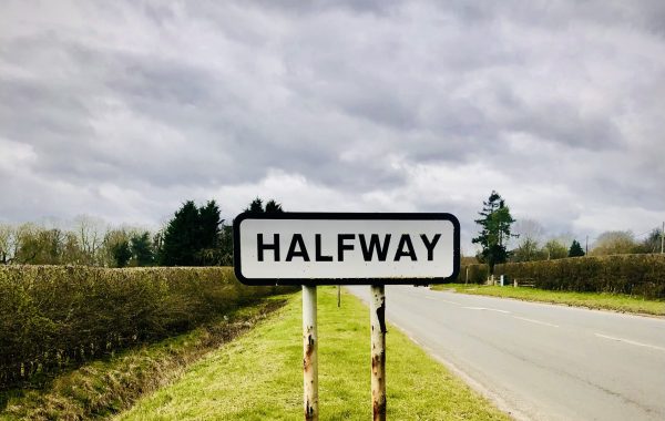 A village sign saying 'Halfway'