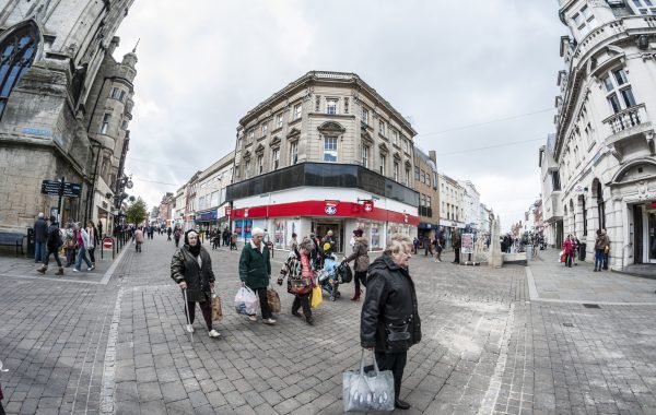 Shoppers in a pedestrianised street in Gloucester