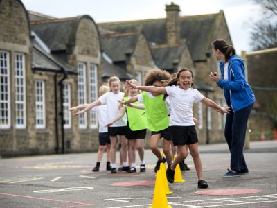 Children during a PE lesson in the school playground