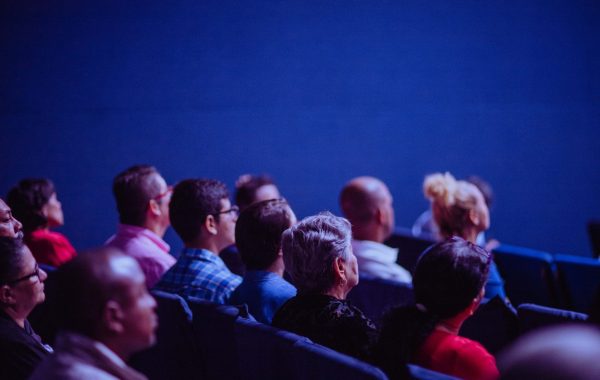 Group of people listening attentively during conference
