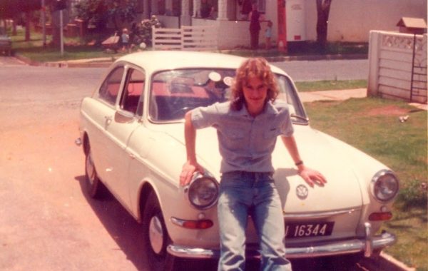 Mike Bell leans on the car he bought from Dustin Hoffman